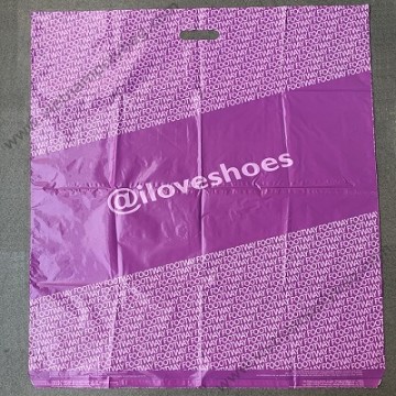 Mailing bags with die cut handle
